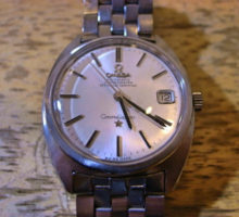 オメガコンステレーション自動巻腕時計修理